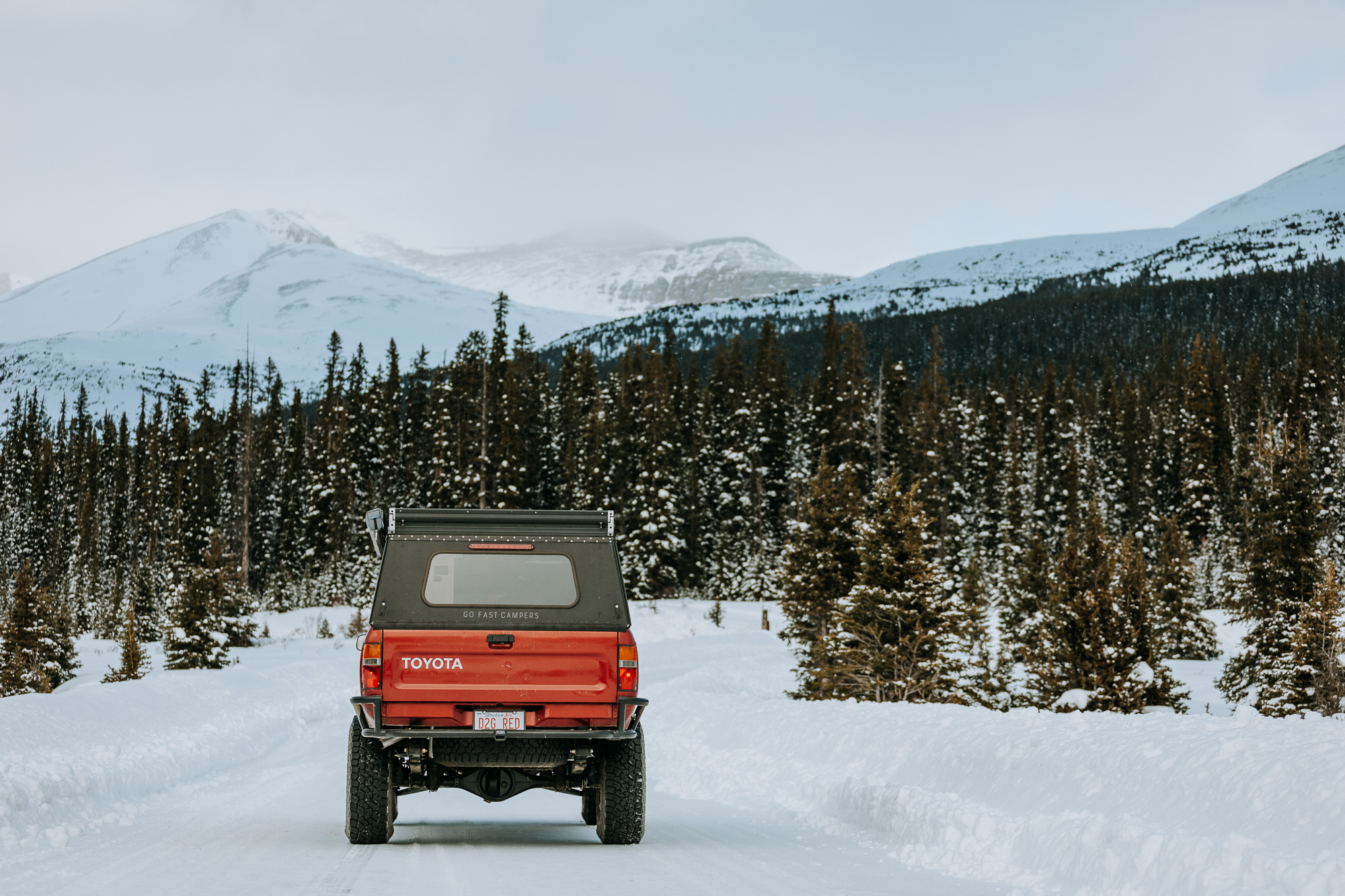 Red Toyota Truck Traveling on Winter | Planar Diesel Heaters